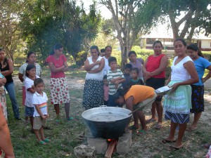 Women were manually processing ramón nuts picking them up.